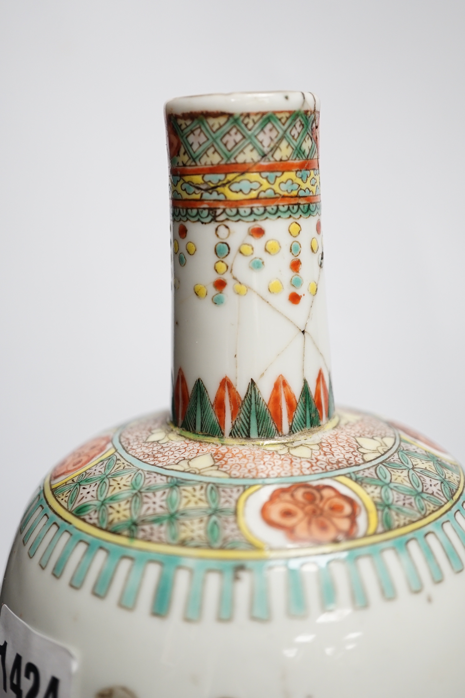 A Chinese famille verte ‘scholars’ vase and a Chinese powder blue bowl, both 19th century, vase, 32cm high